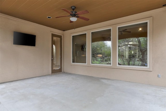 view of patio featuring ceiling fan