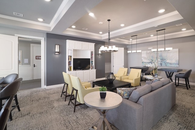 104 Bella Toscana Ave Unit 2211, Lakeway, TX 78734 - living room featuring a raised ceiling, ornamental molding, recessed lighting, carpet floors, and a chandelier