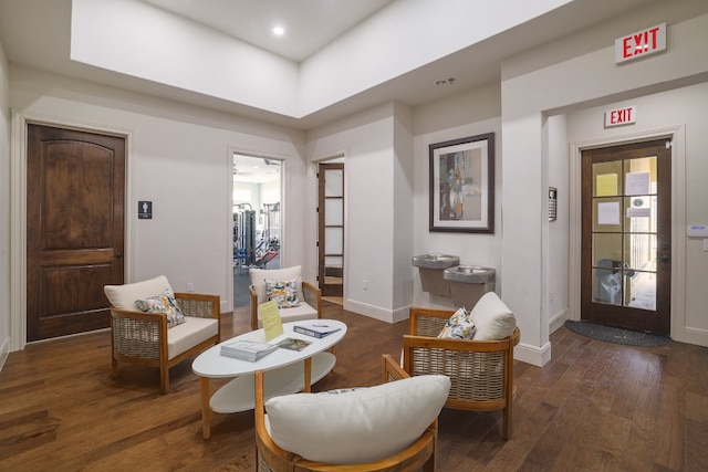 living area featuring dark hardwood / wood-style flooring