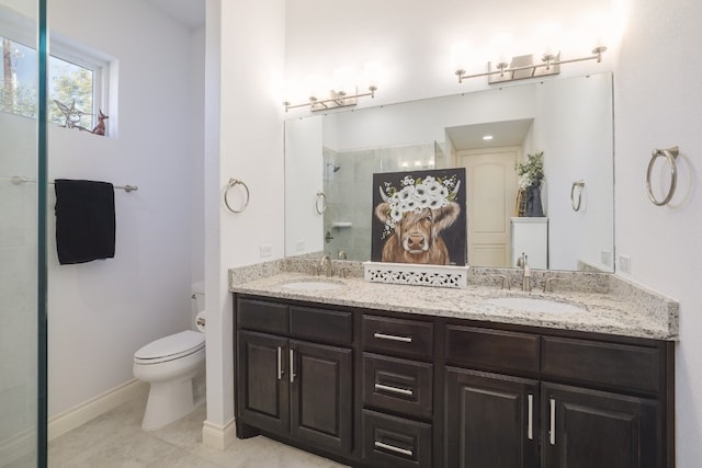 bathroom with vanity, a shower, and toilet