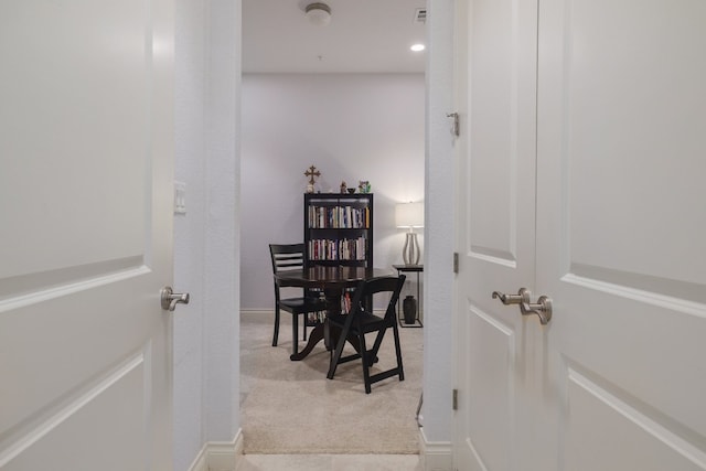 view of carpeted dining space