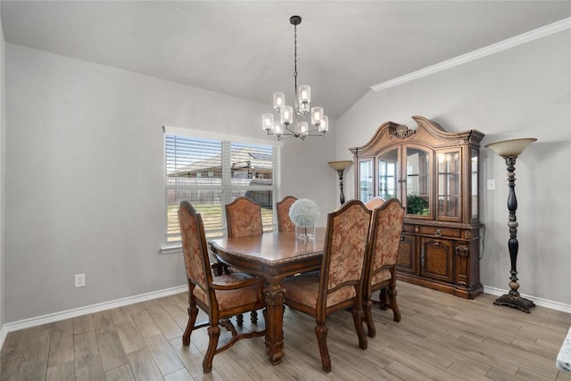 5204 La Terraza Ln, Killeen, TX 76549 - dining area featuring a chandelier, vaulted ceiling, light wood-style floors, and ornamental molding