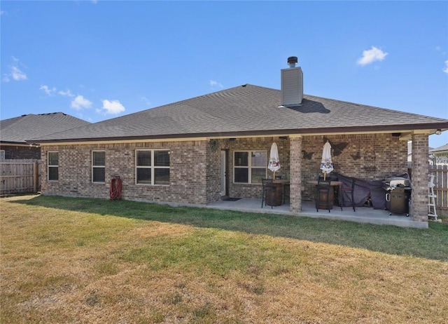 5204 La Terraza Ln, Killeen, TX 76549 - back of house featuring a chimney, brick siding, a patio area, and a shingled roof
