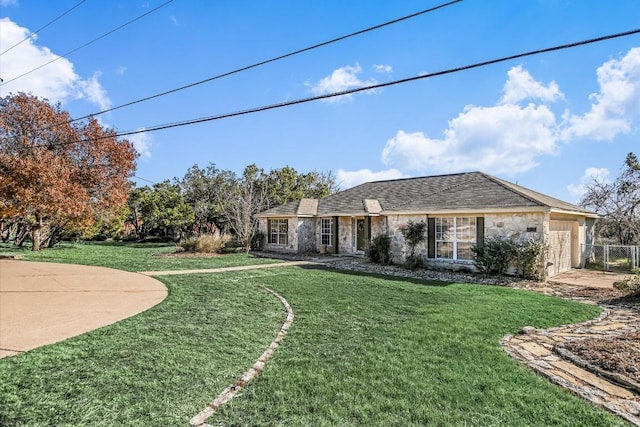 single story home with a front lawn