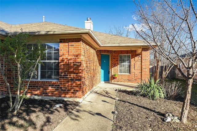 entrance to property with a patio area