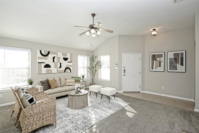 carpeted living room with lofted ceiling, a wealth of natural light, and ceiling fan