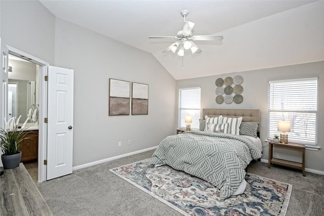 bedroom with ceiling fan, lofted ceiling, and carpet flooring