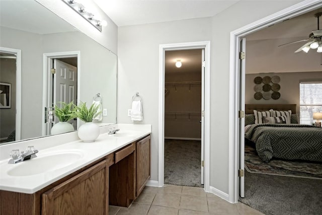 bathroom with vanity, tile patterned floors, and ceiling fan