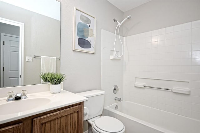 full bathroom with shower / tub combination, vanity, and toilet