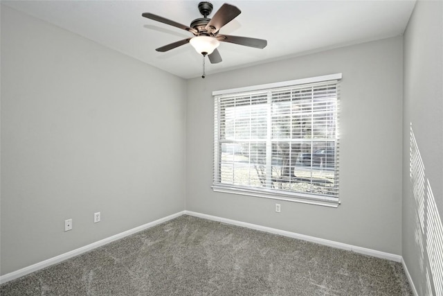 unfurnished room featuring carpet flooring and ceiling fan