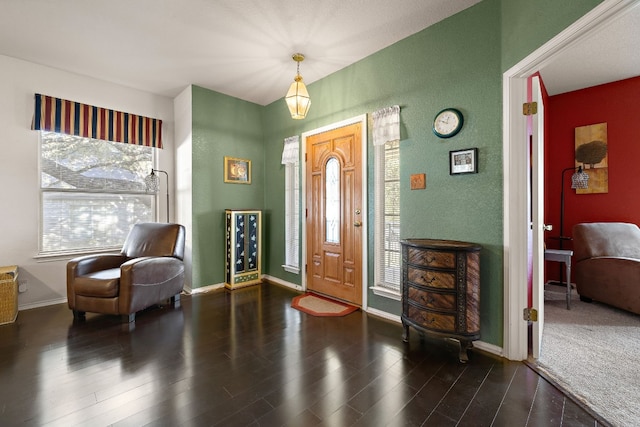 entrance foyer featuring dark hardwood / wood-style floors