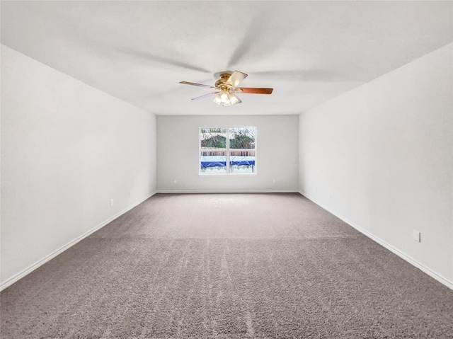 empty room with carpet floors and ceiling fan