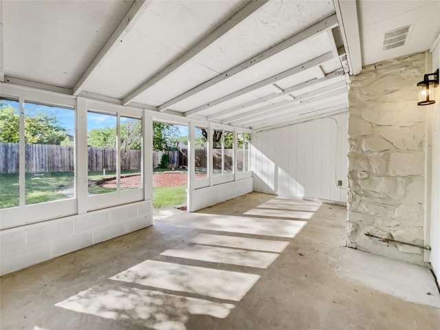 unfurnished sunroom with healthy amount of natural light