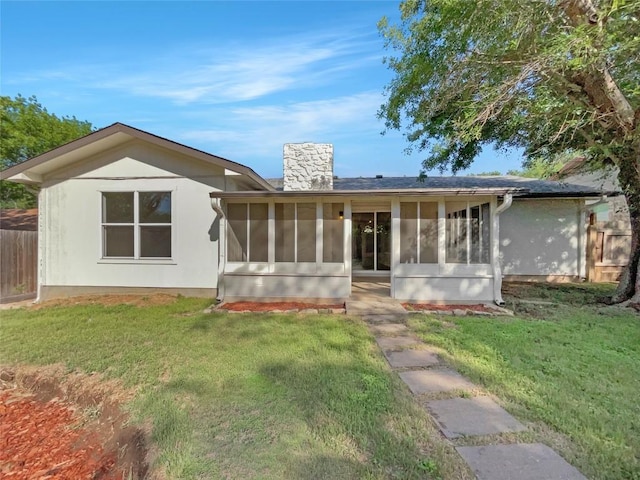 8222 Kearsarge Dr, Austin, TX 78745 - rear view of property with a sunroom and a chimney