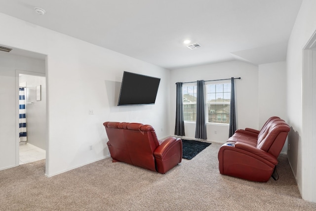 living room featuring light carpet