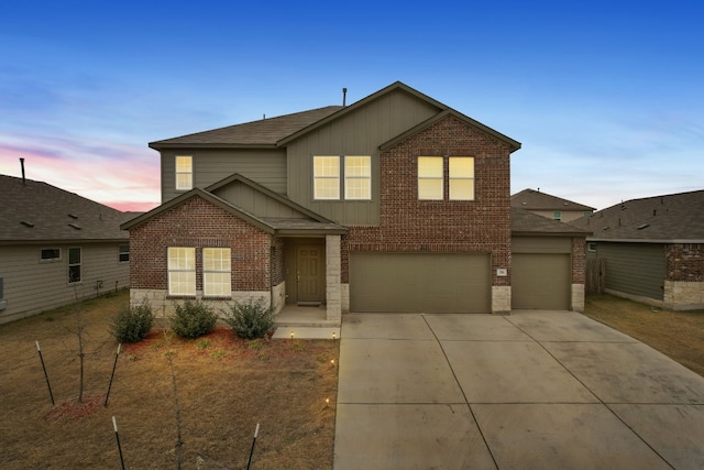 view of front of home with a garage