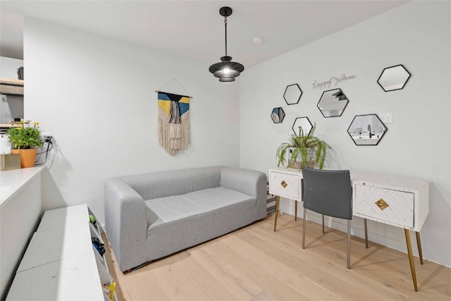 sitting room featuring light wood-type flooring