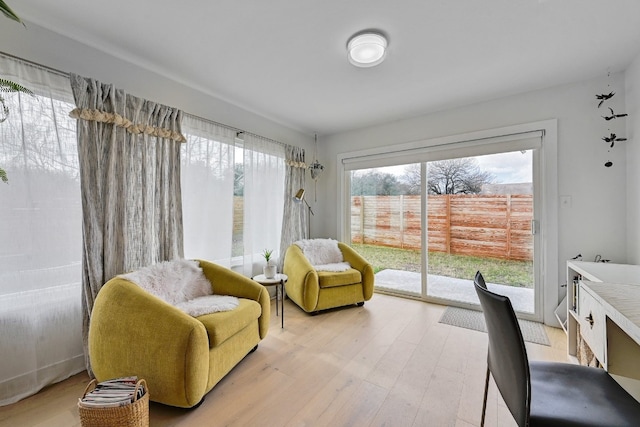 sitting room with light hardwood / wood-style flooring