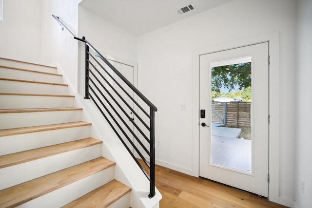 doorway to outside featuring light hardwood / wood-style floors