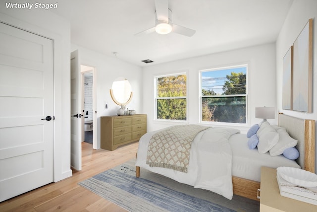 bedroom featuring ceiling fan and light wood-type flooring