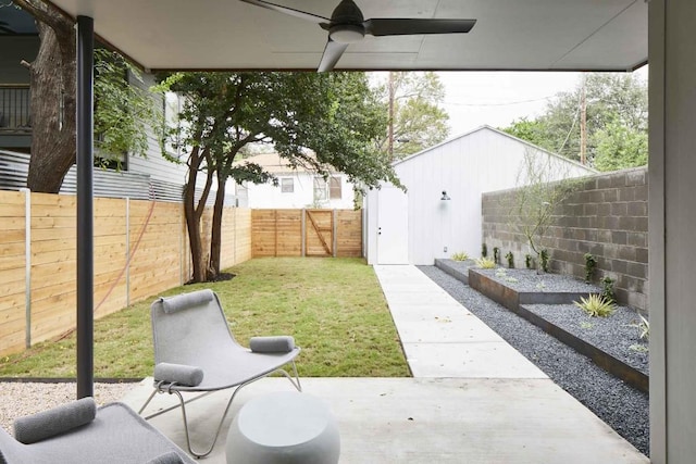 view of yard with ceiling fan