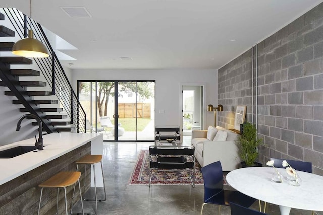 living room featuring sink