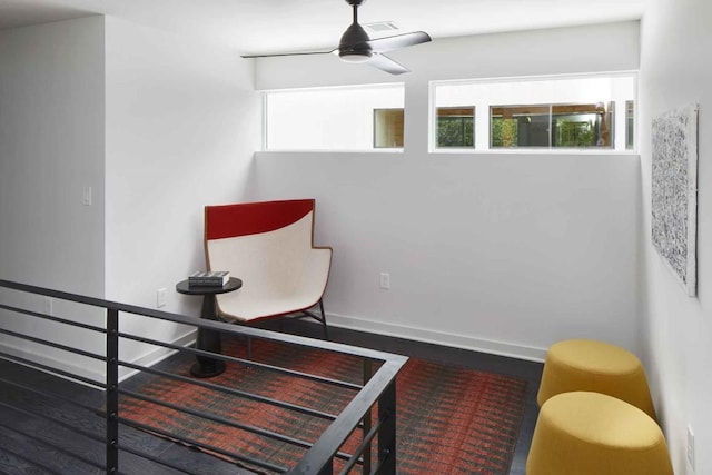 sitting room with ceiling fan