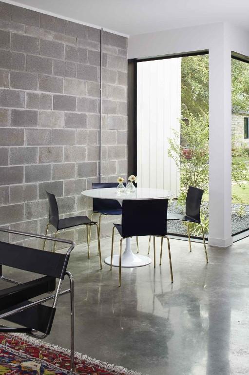 dining room featuring concrete floors