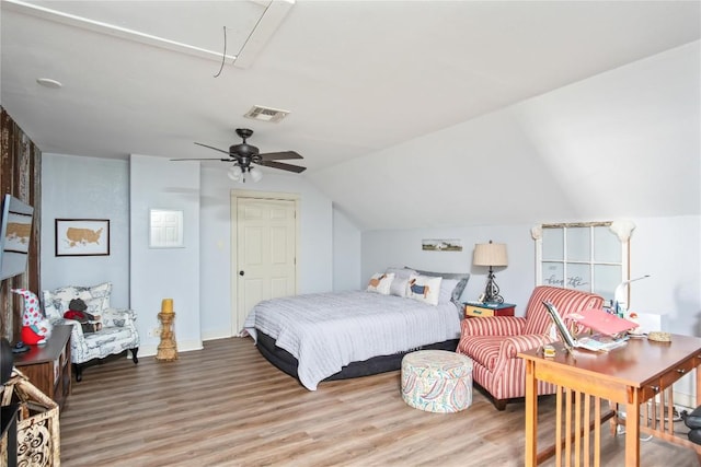 bedroom with lofted ceiling, light wood-type flooring, and ceiling fan