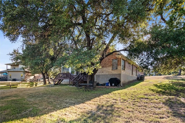 view of yard featuring a deck