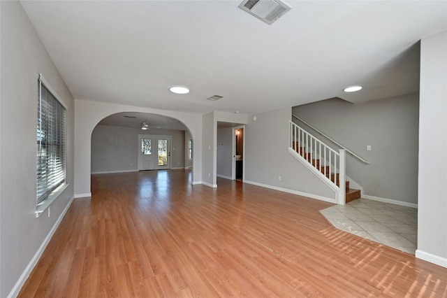 unfurnished living room featuring light hardwood / wood-style flooring