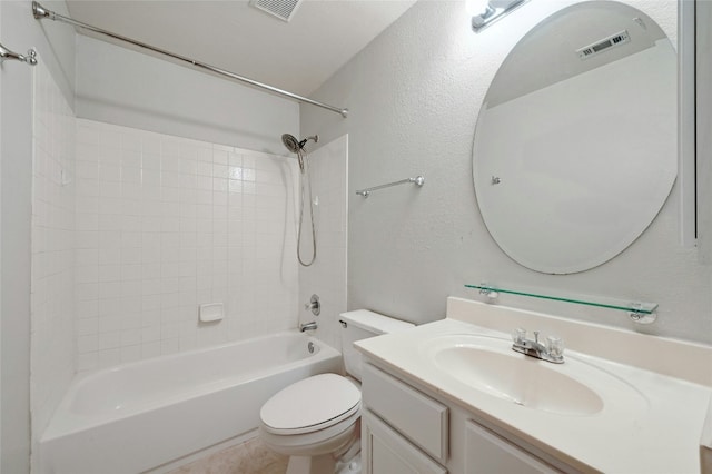 bathroom featuring visible vents, a textured wall, toilet, vanity, and washtub / shower combination