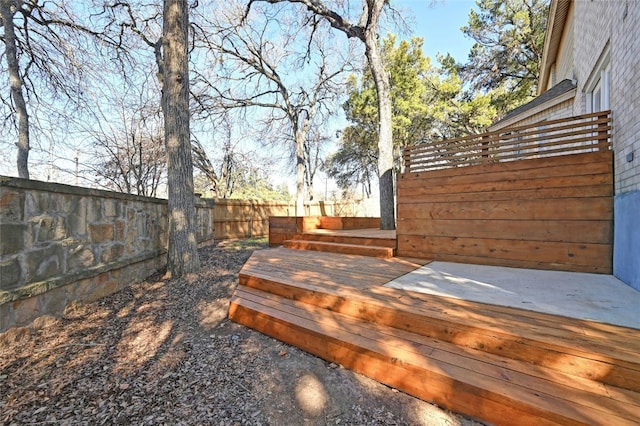 deck featuring a fenced backyard