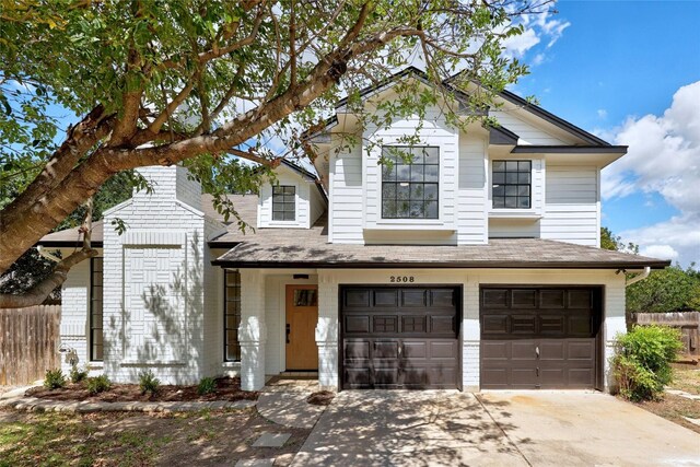 view of front of property with a garage