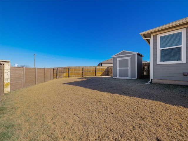 view of yard with a storage shed