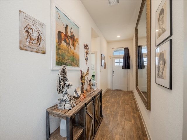 doorway to outside with dark hardwood / wood-style flooring