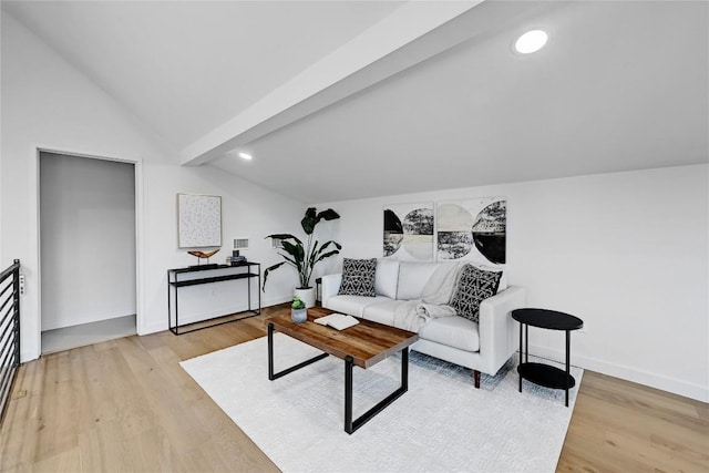 2717 Lyons Rd Unit 1, Austin, TX 78702 - living area with vaulted ceiling, light wood-style flooring, and recessed lighting