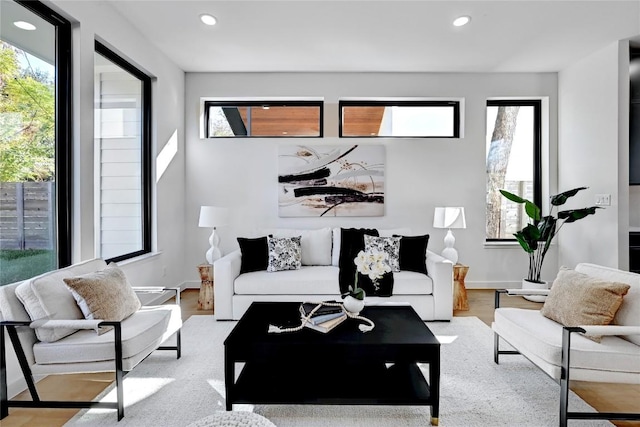 2717 Lyons Rd Unit 1, Austin, TX 78702 - living room with light wood finished floors and recessed lighting