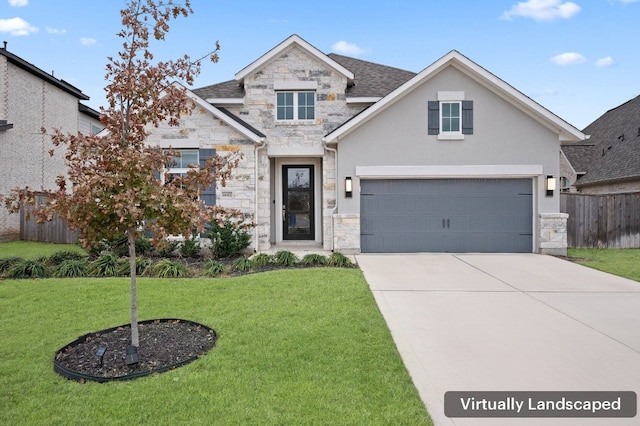 view of front of property featuring a garage and a front lawn