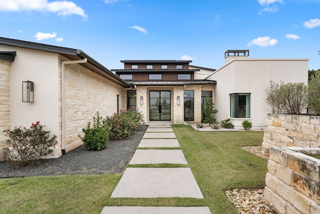 exterior space with a front lawn