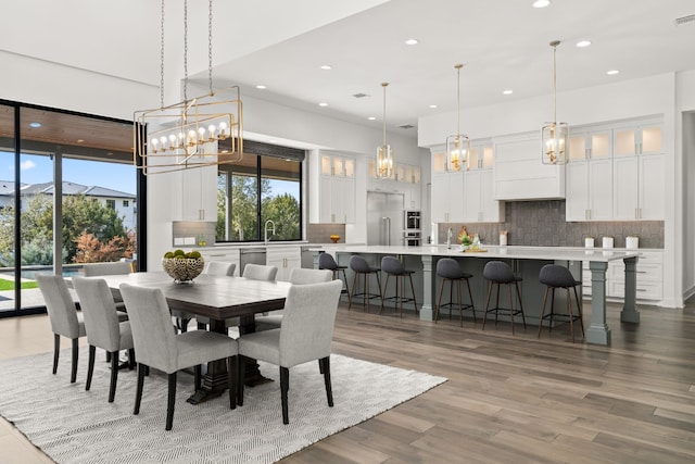 dining space featuring hardwood / wood-style flooring