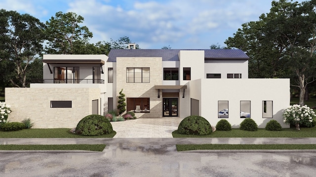 contemporary home featuring french doors and a balcony