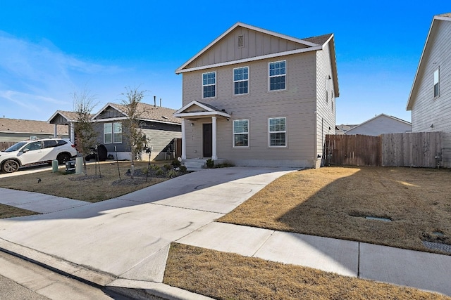 13413 Mussel Run, Elgin, TX 78621 - traditional-style home featuring board and batten siding and concrete driveway