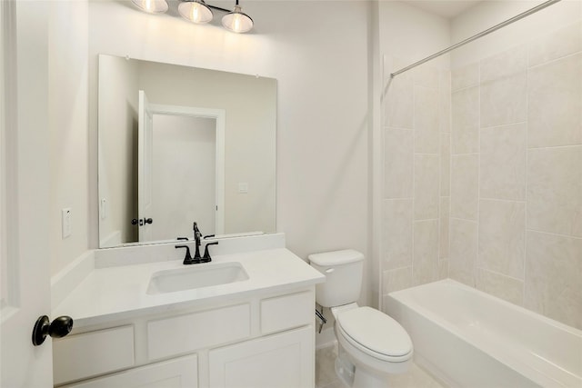 bathroom featuring vanity, toilet, and shower / bathtub combination