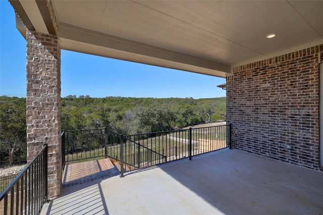 balcony with a wooded view