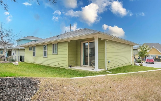 1905 Standing Tall Dr Unit 40, Leander, TX 78641 - back of property featuring a lawn