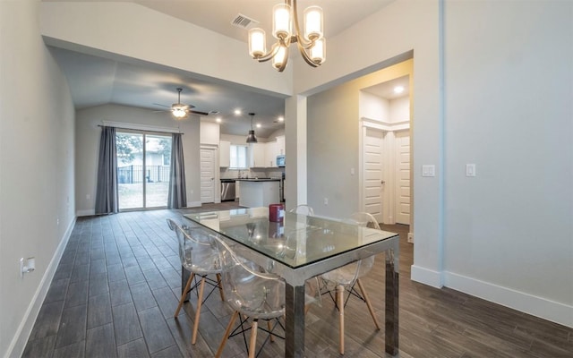 1905 Standing Tall Dr Unit 40, Leander, TX 78641 - dining space with dark wood-style flooring, a chandelier, baseboards, ceiling fan, and vaulted ceiling
