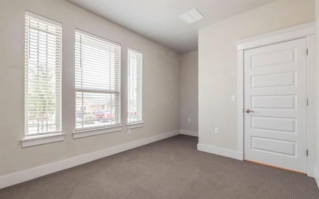 1905 Standing Tall Dr Unit 40, Leander, TX 78641 - carpeted empty room with baseboards