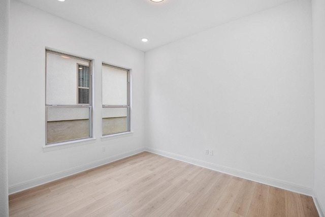 228 Running Fawn, Georgetown, TX 78628 - empty room featuring light wood-type flooring and recessed lighting