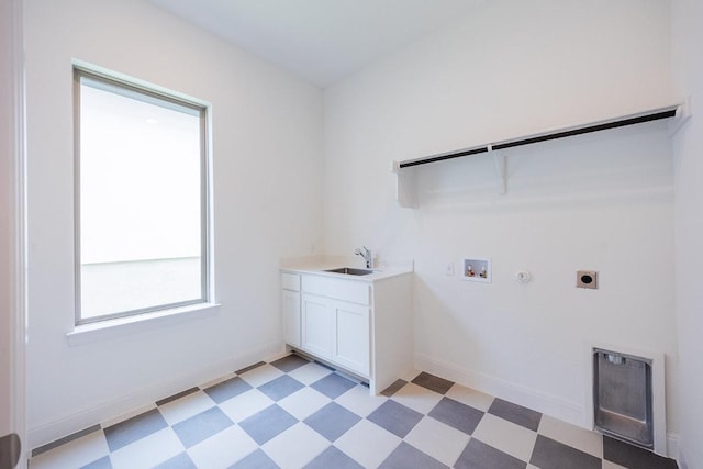 228 Running Fawn, Georgetown, TX 78628 - washroom with hookup for an electric dryer, washer hookup, light floors, cabinet space, and hookup for a gas dryer